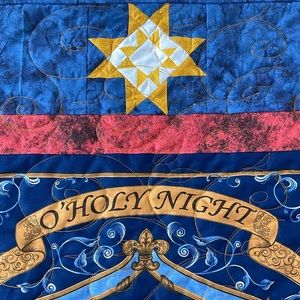 Paper pieced star nativity quilt.  Hand made and unique